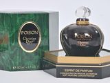 an image of a bottle of perfume sitting on top of a box