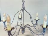 an image of a chandelier with five lights hanging from it ' s ceiling
