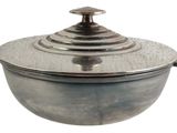 an image of a metal pot with a lid on a white background
