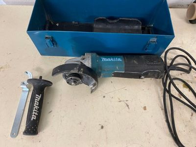 a blue box with tools on it on a table
