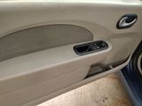 a picture of a car door handle with the door handle open
