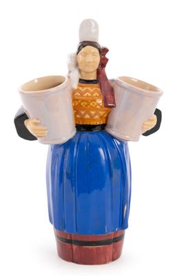 a figurine of a woman holding two cups of coffee