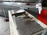 a lot of tools on the table in the kitchen