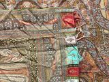 an image of a close up of a quilt with many different designs on it