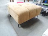 a couch that is sitting in the middle of a room