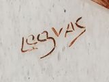 a close up of a piece of wood with writing on it
