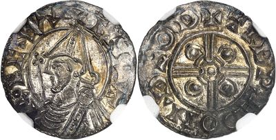 a silver coin with an image of a man and a cross on it