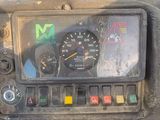 a close up of the dashboard of a tractor