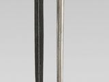 two baseball bats that are next to each other
