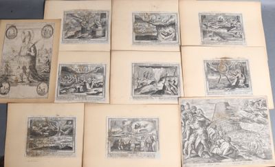 several old books with drawings on them sitting on a table