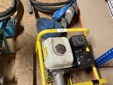 many hoses and a water pump on the floor