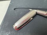 a pen that is sitting on top of a table