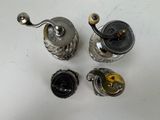 four different types of teapots on a white table