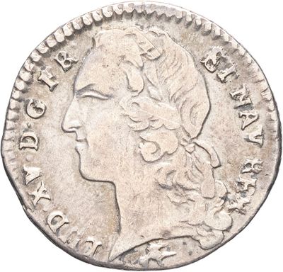 une pièce d'argent portant l'image d'une tête de femme