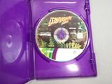 a purple dvd case with a picture of a lizard inside of it