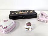 a small box with a heart shaped box and a small box with a heart shaped box on it