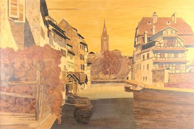 un tableau représentant une rivière qui traverse une ville