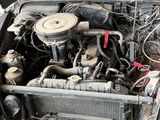 a car engine that is sitting in the back of a truck