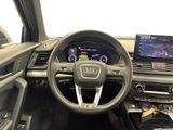 the interior of a car with a steering wheel, dashboard, and display screen