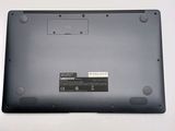 a close up of a laptop with a battery on it