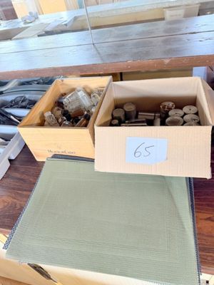 a box of rocks on a table next to a box of rocks