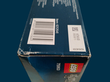 a box that is sitting on a blue surface
