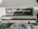 a bag of doughnuts sitting inside of a machine