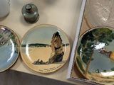 three plates that are sitting on a table