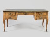 an antique desk with marble top and two drawers