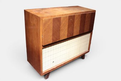 an image of a wooden cabinet with a tiled top
