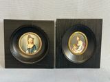 pair of framed miniature portraits of a lady and a cat