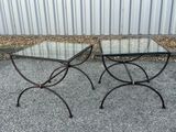 pair of wrought iron and glass side tables