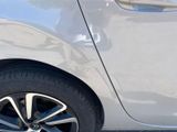 a close up of a car ' s tire on the street