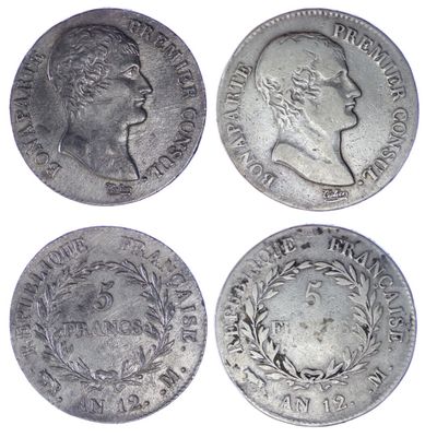 quatre types différents de pièces d'argent sur fond blanc