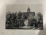 a black and white photo of a church on a table