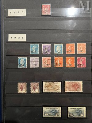 a picture of a collection of stamps on display in a glass case