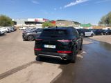many cars parked in a parking lot in a parking lot
