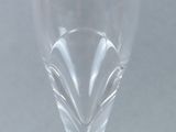 a wine glass that is sitting on a table