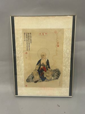 an old chinese painting of a man sitting on the ground
