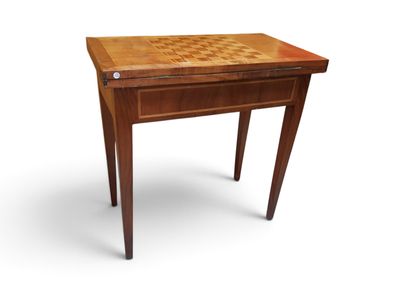 a wooden table with a chess board on top of it