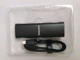 a picture of a black usb drive in a package