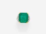 an emerald and diamond ring