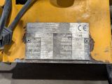 a close up of a metal plate on a machine