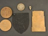 an image of a group of coins and other items on a table