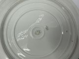 a white plate with a black and white design on it
