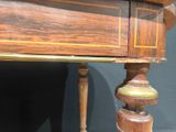 a close up of a desk with a drawer on it