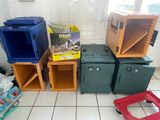 many boxes of different colors and sizes on the floor