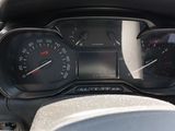 a close up of a car dashboard with a speedometer and gauges