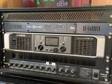 a rack with a bunch of electronics on top of it