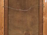 an old picture of a wooden frame with a wire in it